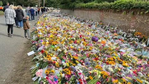 Kate Scotter/BBC Flowers outside Sandringham