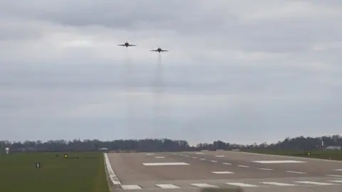 Oli Constable/BBC The Red Arrows over the runway