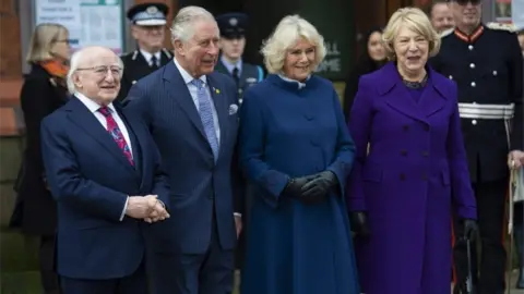 EPA The Prince of Wales and Duchess of Cornwall meet Irish President Michael D. Higgins and his wife Sabina Coyne-Higgins