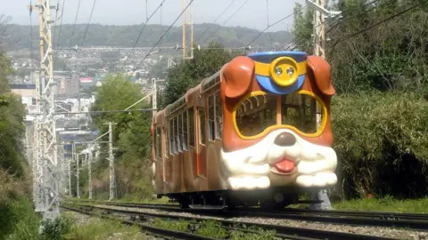 Wikimedia/Kansai Explorer A funicular railway car shaped like a dog on Kintetsu Ikoma Cable Line in Nara prefecture