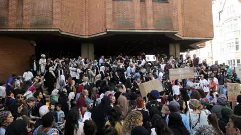 Getty Images Protestors outside Kensington Town Hall