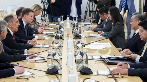 EPA A handout photo made available by the Russian Foreign Ministry's press service shows Russian Foreign Minister Sergei Lavrov (2-L) speaking with Chinese Foreign Minister Wang Yi (2-R) during their meeting in Moscow, Russia, 18 September 2023.