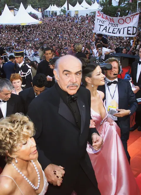 Getty Images Sean Connery, wife Micheline (left) and Catherine Zeta Jones at the Cannes Film Festival in 1999