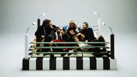 Studio Azzurro Memphis designers with Masanori Umeda's Tawaraya Bed 1981