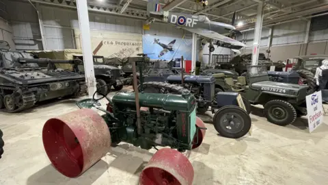 Mike Liggins/BBC Tractors and war vehicles