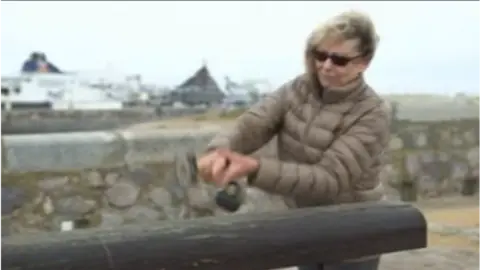 Ann Barnes smashes a stun gun