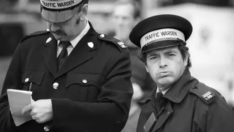 Chris Porsz Two traffic wardens