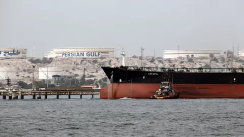 AFP File photo shows an Iranian tanker docking at the platform of an oil facility on Kharg Island, in the Gulf (12 March 2017)