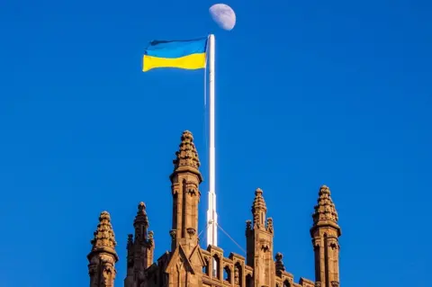 Derek Morrison Flag flying from church