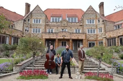 Lucy Merrilyn Todd Sharpville and his band