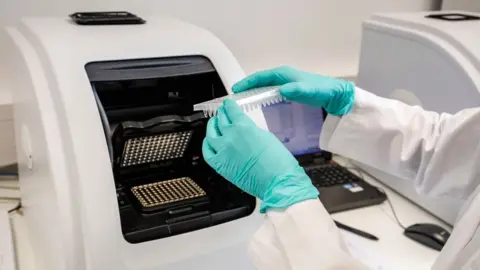 Getty Images PCR test analysis machine in Germany