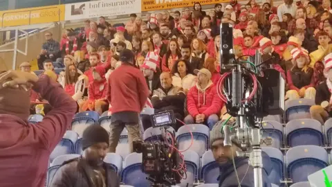 FILM Suffolk Extras at the Colchester Jobserve Communtiy Stadium