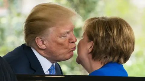 EPA US President Donald J. Trump (L) welcomes German Chancellor Angela Merkel (R) at the West Wing of the White House in Washington, DC, USA, 27 April 2018