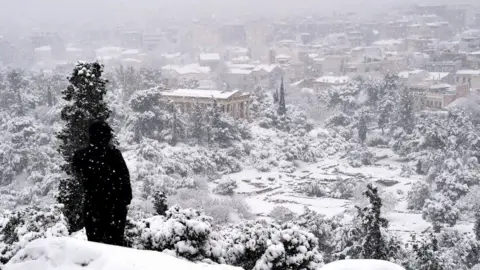 Getty Images Ancient Agora archaeological site during a heavy snowfall in Athens