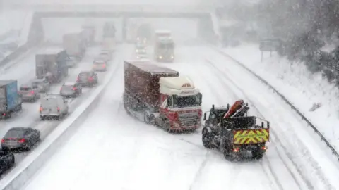 Andrew Milligan/PA WIRE Lorry stuck in snow