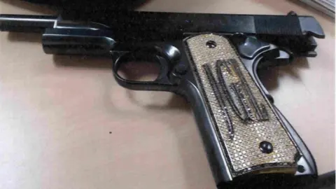 Reuters A diamond-encrusted pistol that government witness Jesús Zambada said belonged to the accused Mexican drug lord Joaquin "El Chapo" Guzman