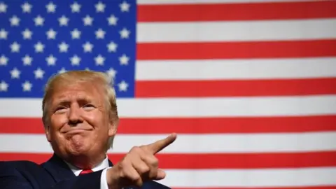 Getty Images US President Donald Trump speaks during a "Keep America Great" campaign rally at the SNHU Arena in Manchester, New Hampshire, on August 15, 2019