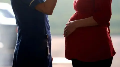 PA Media Anonymous nurse and expectant mum