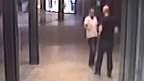 Devon and Cornwall Police CCTV image of two men