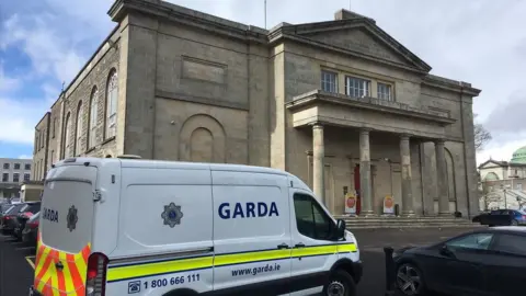 BBC A Garda Síochána van parked outside Cavan Courthouse