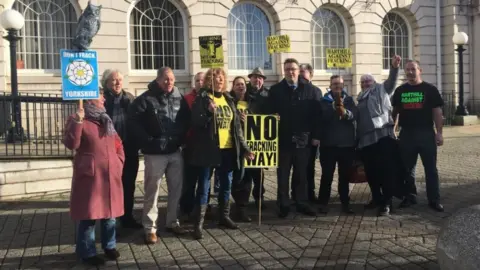 Protestors outside Rotherham Town Hall