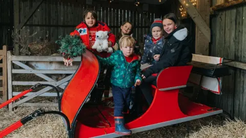 CHRISTIAN FURSE Elliott with his four siblings