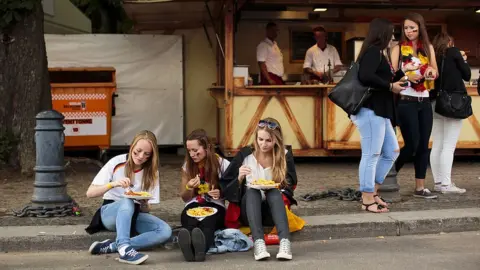 Carsten Koall/Getty Images German fans at the 2014 FIFA World Cup