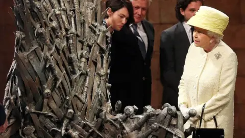 Getty Images Queen Elizabeth gazes at the coveted Iron Throne