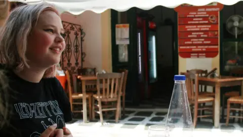 R Allen Rachel Finke in restaurant