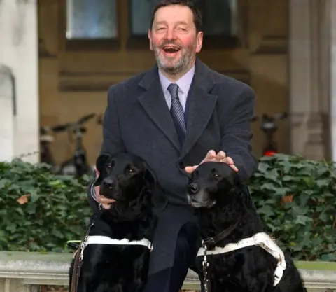 Getty Images Lord Blunkett with Sadie and Lucy