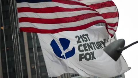 Getty Images A 21st Century Fox flies at the Fox News headquarters in Manhattan