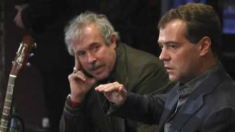 Getty Images Andrei Makarevich (left) and then-President Dmitry Medvedev