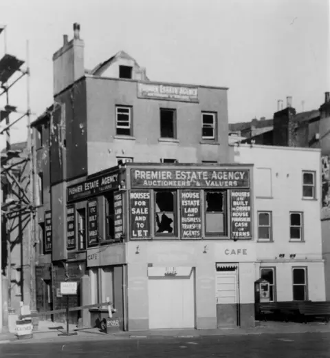 Société Jersiaise Photographic Archive Blown out windows of a shop near Caledonia Place at the Weighbridge in St Helier