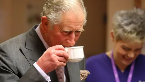 Andrew Milligan Prince Charles drinking tea