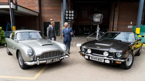 Getty Images Daniel Craig showing Prince Charles around the James Bond set