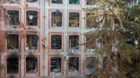 Getty Images The building of the Faculty of Economics of the V N Karazin Kharkiv National University, destroyed by a Russian missile in Kharkiv, Ukraine on March 24, 2022