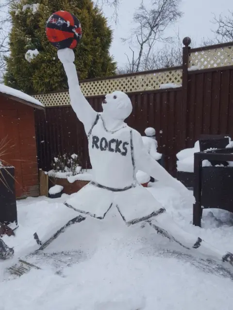 Scott Lorraine Scott Lorraine from Glasgow sent in this basketball-playing ice sculpture