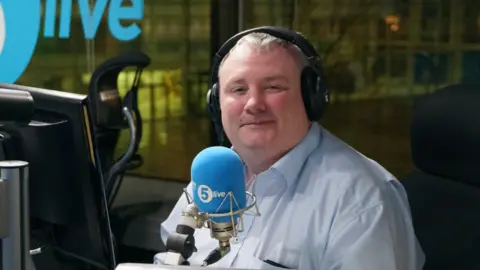 Stephen Nolan presenting his BBC 5 Live programme