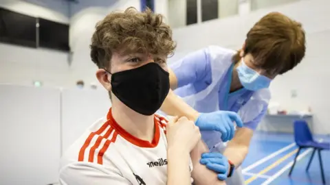 Liam McBurney Eoin McCullagh being vaccinated