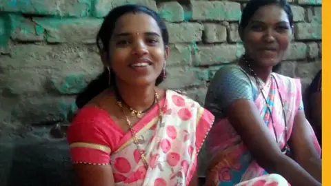 Women practise saying their husband's names