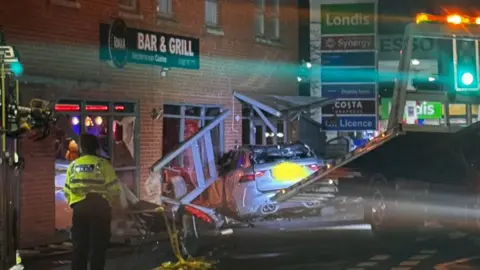 Cheshire Police Emergency services on scene after a vehicle crashed into the Rokka Bar and Grill in Culcheth