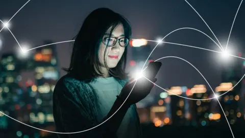 Getty Images Person in a smart city