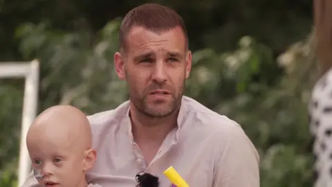 BBC Footballer Tommy Spurr (right) with son Rio