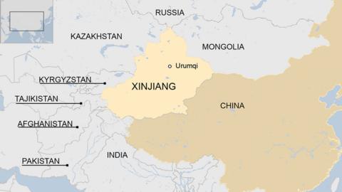 China Xinjiang: Ten dead in Urumqi residential block fire