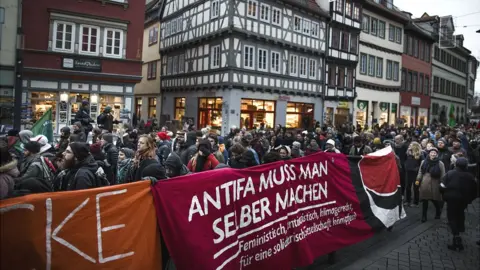 Getty Images Protesters in Erfurt, 6 Feb 20