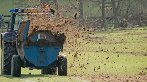 mikedabell/Getty Images Muck spreading