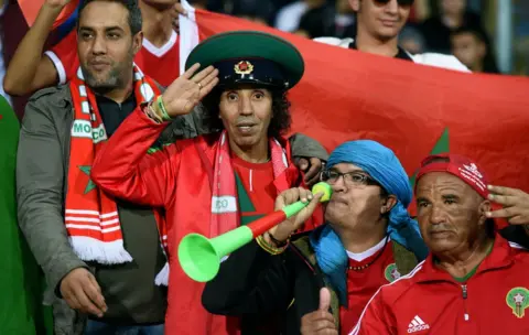 AFP Morocco supporters cheer ahead of the Africa Cup of Nations qualifier football match between Morocco and Cameroon at the Mohamed V Stadium in Casablanca, on November 16, 2018