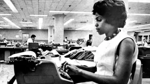 Dorothy working at the Washington Post