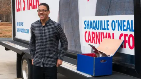 Carnival Cruise Line Darian Lipscomb with a Carnival Cruise Line poster