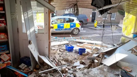 Ian Benney Debris in shop after ram-raid